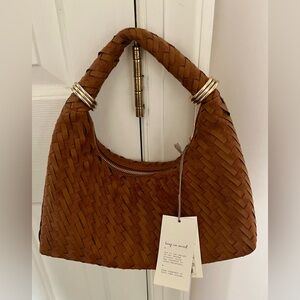 a new day Brown woven handbag with gold and silver ring accents